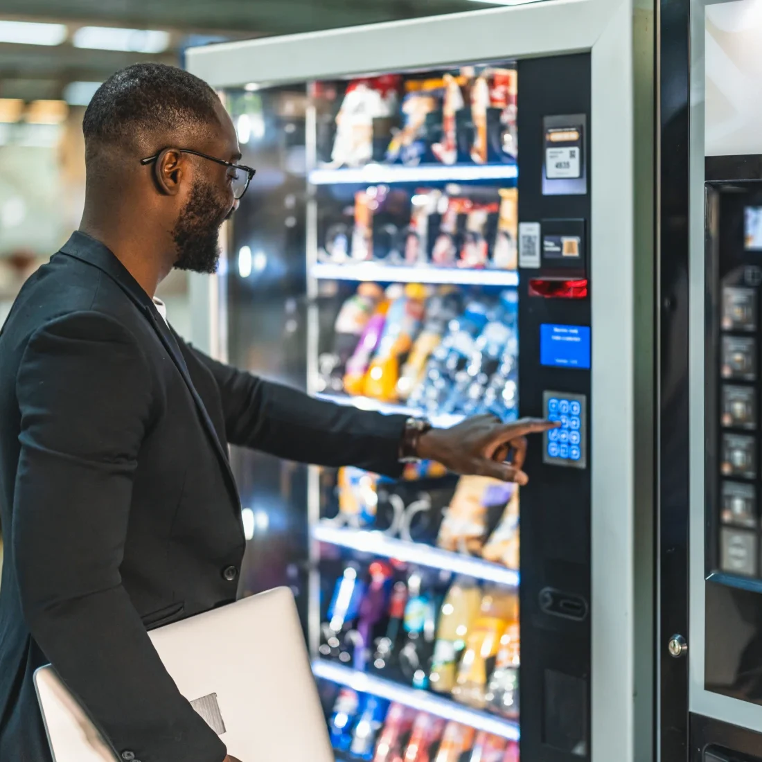 Individual purchasing from vending machine